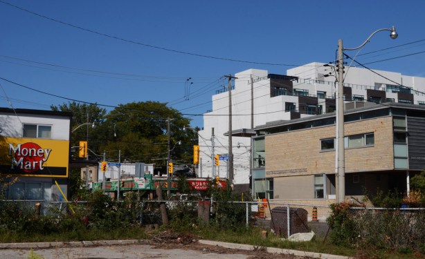 view from a vacant lot at Lower Coxwell and Eastern, looking northeast towards Coxwell and Queen East intersection