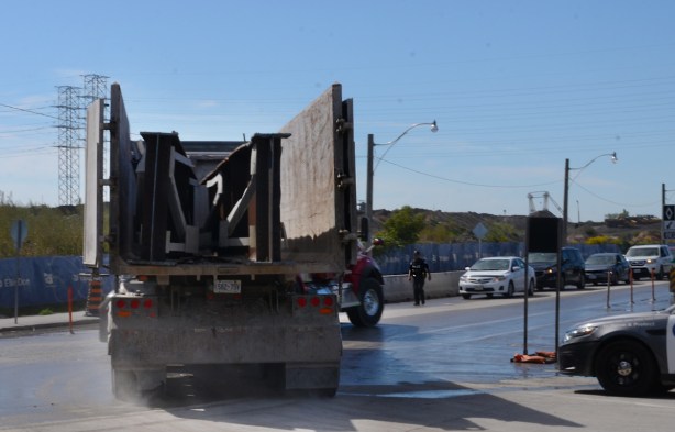 truck taking away girders that have been removed