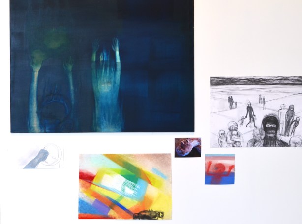 a number of paintings by Mirian Cahn on an art gallery wall 