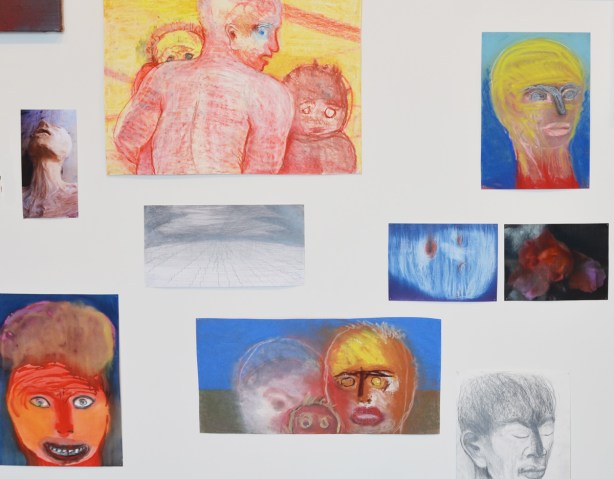 a number of paintings by Mirian Cahn on an art gallery wall 