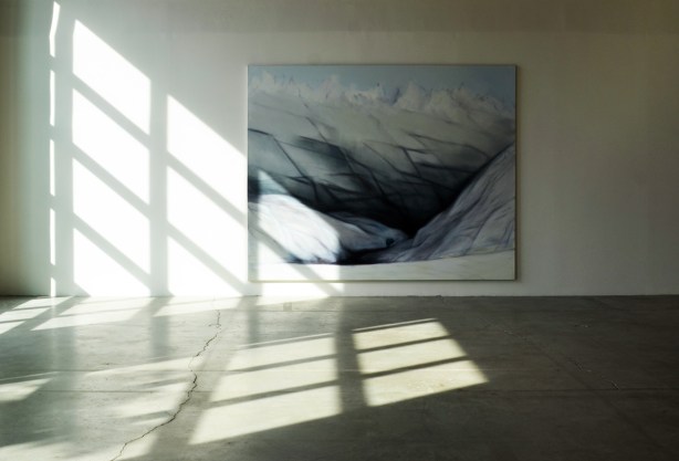 large painting on a wall in a gallery by awindow with sunlight coming in and making patterns with shadows  and light on the floor and on the wall 
