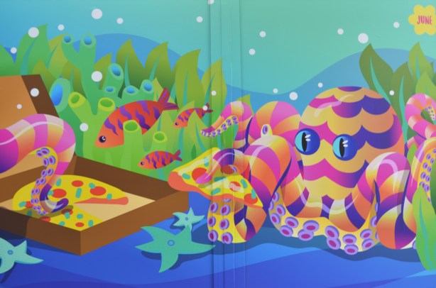stylized marine scene, pink and yellow striped octopus, fish, starfish,