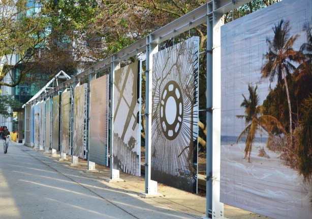 a line of 7 large photographs as part of a display by Metro Hall on King Street 