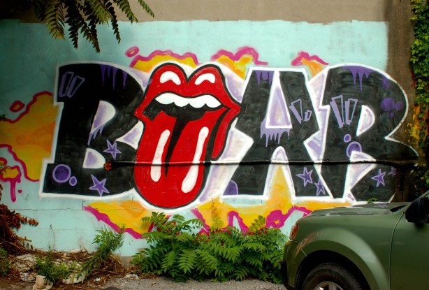 photo taken in 2012 of street art with iconic red tongue from rolling stones