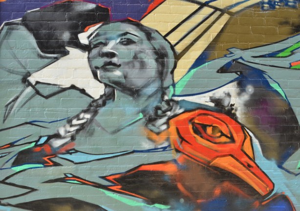 street art painting of a grey woman