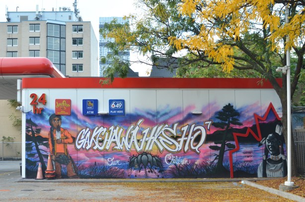indigenous theme mural on the side of a Petro Canada station at Richmond and Jarvis