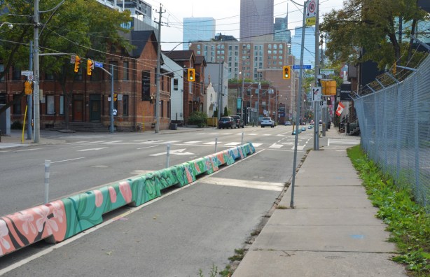 Richmond Street east, at Berkeley, with barrier between bike lanes and other traffic