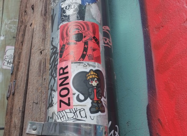 stickers on a pole, zonr, urban ninja squadron in red 