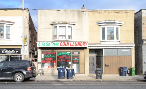 buildings on Davenport Ave., two storey, one is A.J.'s So Fresh Coin Laundry