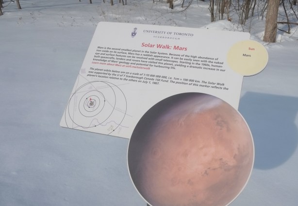 from the solar walk at utsc, Mars, a picture of the planet plus a plaque with information about mars