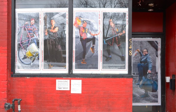 Chinatown poster series on residents, in windows and door on Dundas