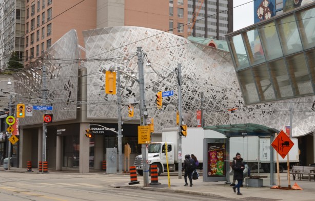 Rosalie Sharp pavilion on the southeast corner of Dundas and McCaul, shiny metal facade on the building, 