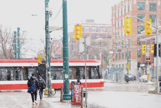 TTC streetcar at Queen and Spadina, in the snow