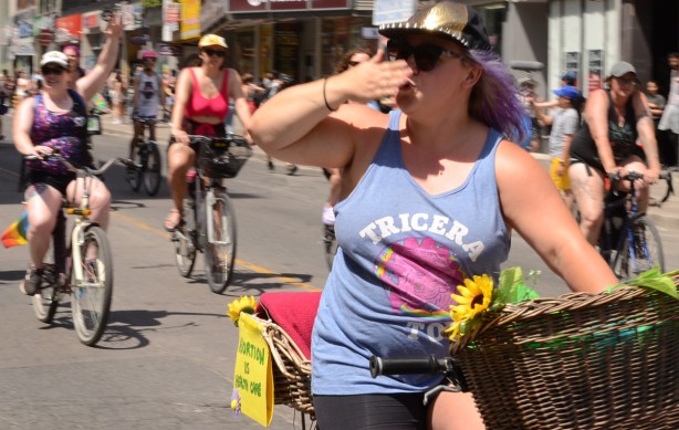 bike rider blowing kisses to the crowd