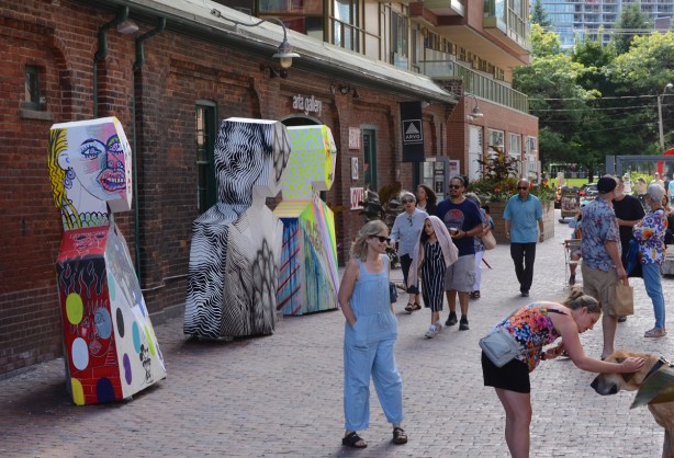 painted sculptures at Distillery District, abstract people shapes