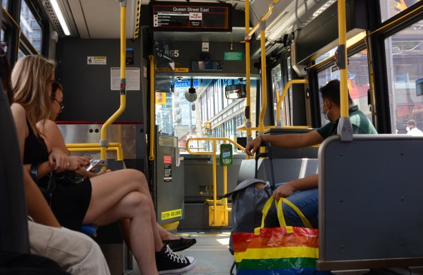 people sitting on a TTC bus