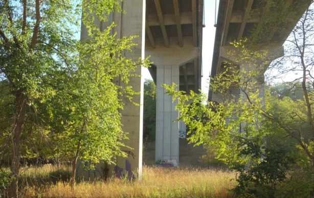 tall concrete supports holding up bridge, Kingston Road, over Highland creek and Colonel Danforth park