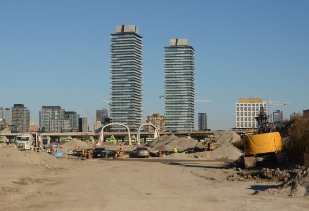 looking north where the new part part of Cherry Street is being built, new double bridge to go over the Keating channel as well as condos in Distillery District are in the background