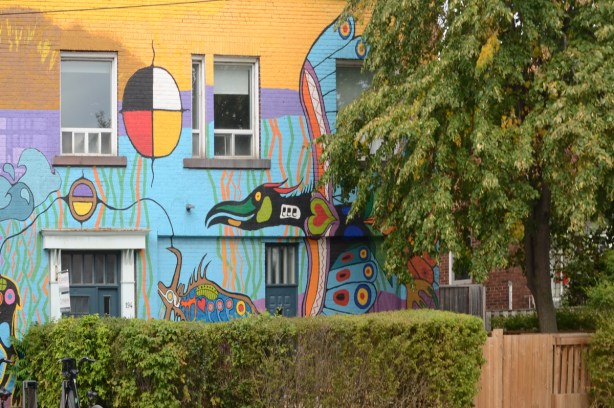 right hand side of mural painted by Philip Cote and Jim Thierry Bravo, indigenous symbols, thunderbird