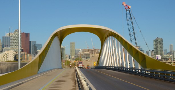 looking north up cherry street through new yellow and white curvy bridge