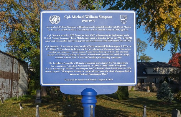 blue plaque in Highand Creek cemetery for cpl Michael William Simpson