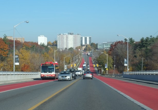 Morningside Ave., looking north, from north of Lawrence to Centennial College, and U of T Scarborough. The red lanes are for buses.