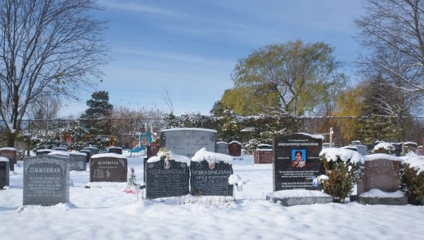 monument stones in St. Margarets cemetery in winter, two with veerasingham surname, a zimmerman, and a de nobrega