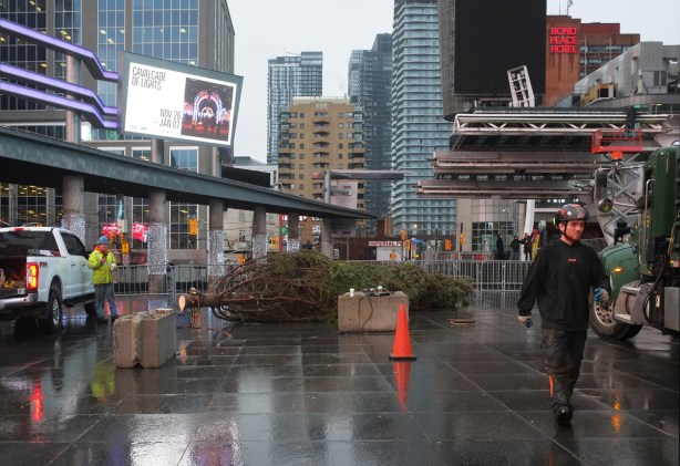 morning, on a dark wet day, Yonge Dundas square, wet pavement,