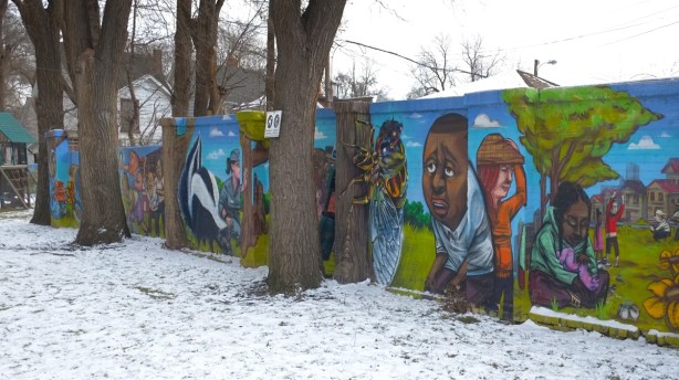 behind some trees, elicser elliot mural