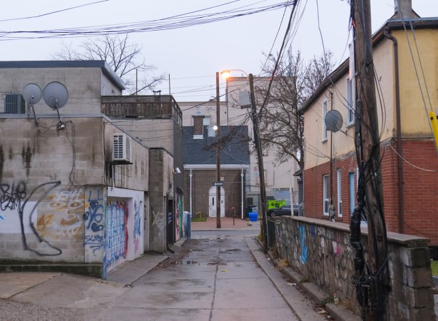 alley behind Gerrard St., garages, house
