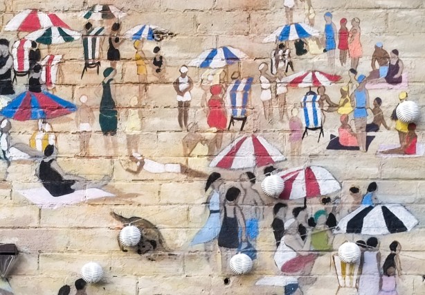 close up of part of Jim Bravo mural in Parkdale, beach scene, celebrating 100 years, Sunnyside Beach