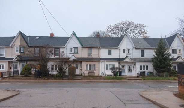line of row houses on Noble Street, all two storey, all with gables, 