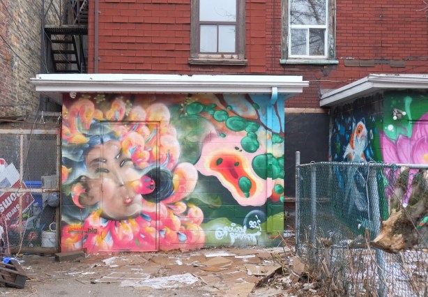 murals on the back of Chinatown stores, in an alley, 