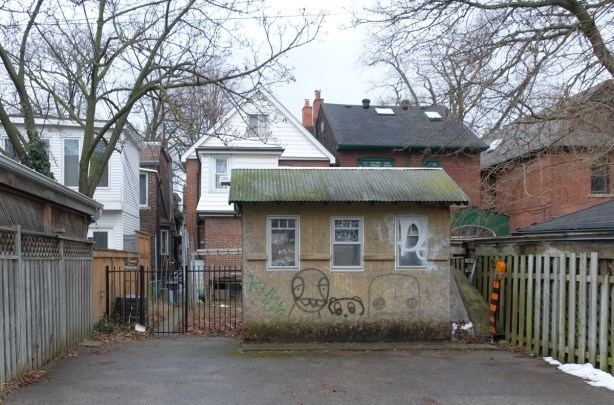 a small shed behind a house, lane behind Danforth 