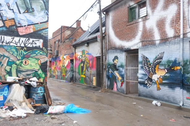 chinatown murals in an alley