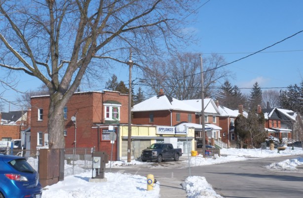 appliance store in red brick building in residential neighbourhood