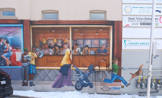 part of mural by Christiano De Araujo, windows of time, in Weston, history series, woman in yellow head scarf pushes a stroller past a restaurant window while a young boy wearing glasses chases birds 