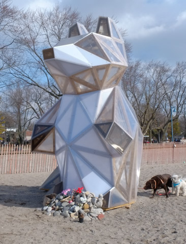 winter stations installation at Woodbine Beach, large raccoon made of wood and semi-clear plastic