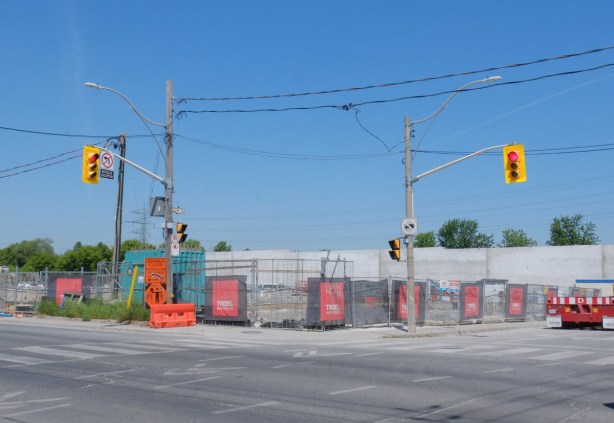 corner of an intersection that is one big construction site