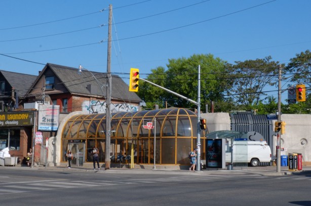 Dupont subway station, entrance on northwest corner of Dupont and Spadina, transparent structure with dome shaped curved roof
