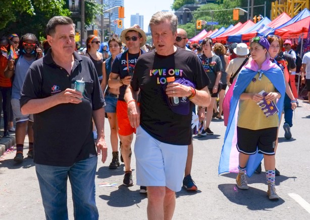john tory, ex mayor of toronto, walks on church street before the pride parade