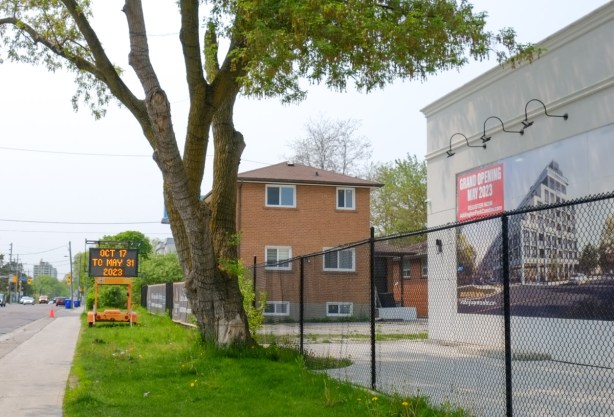 black metal construction fence around a building site