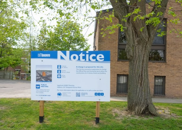 blue and white city of toronto development notice