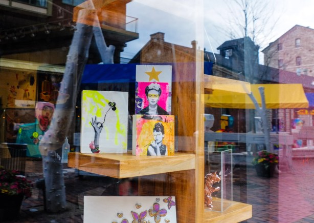 reflections in a small gallery window