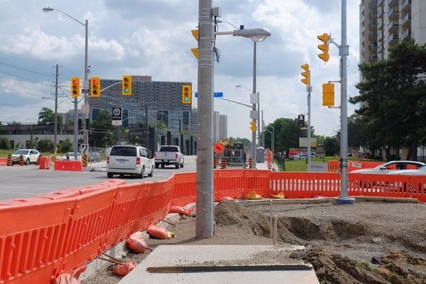 Finch avenue, construction new LRT line, sidewalk comes to an end, orange barricades