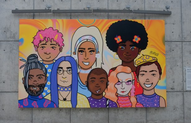 painting by Hana Shafi in bold colors, a group of diverse people