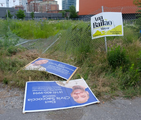 signs on the ground, election signs for mayor by election