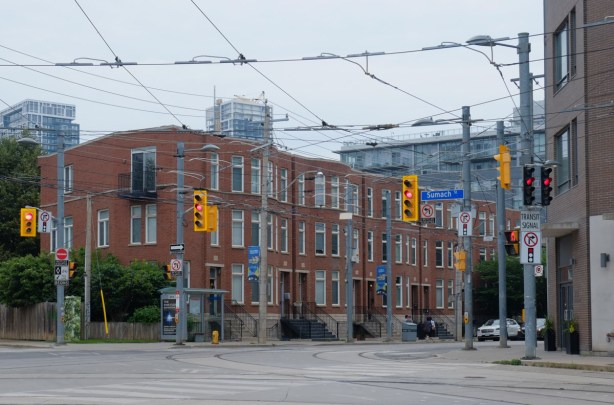 newer low rise apartment building, or row houses on the northeast corner of King and Sumach