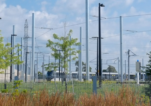 new LRT trains, black and grey, parked in TTC lot, 