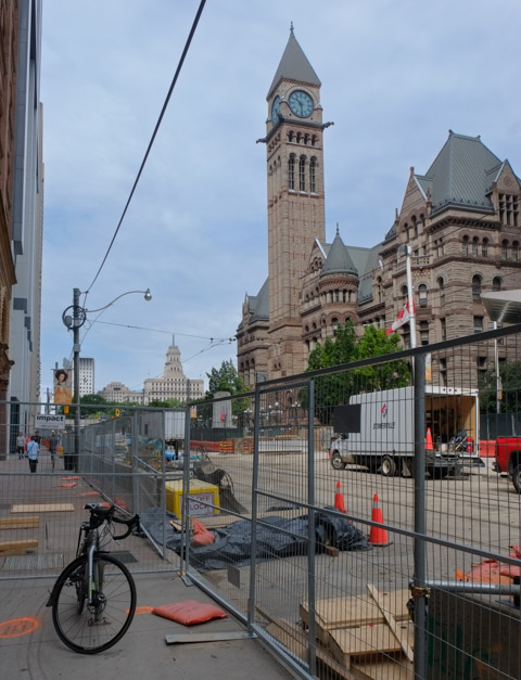 old city hall, Queen Street, with construction fence in front, for road work, and subway work 